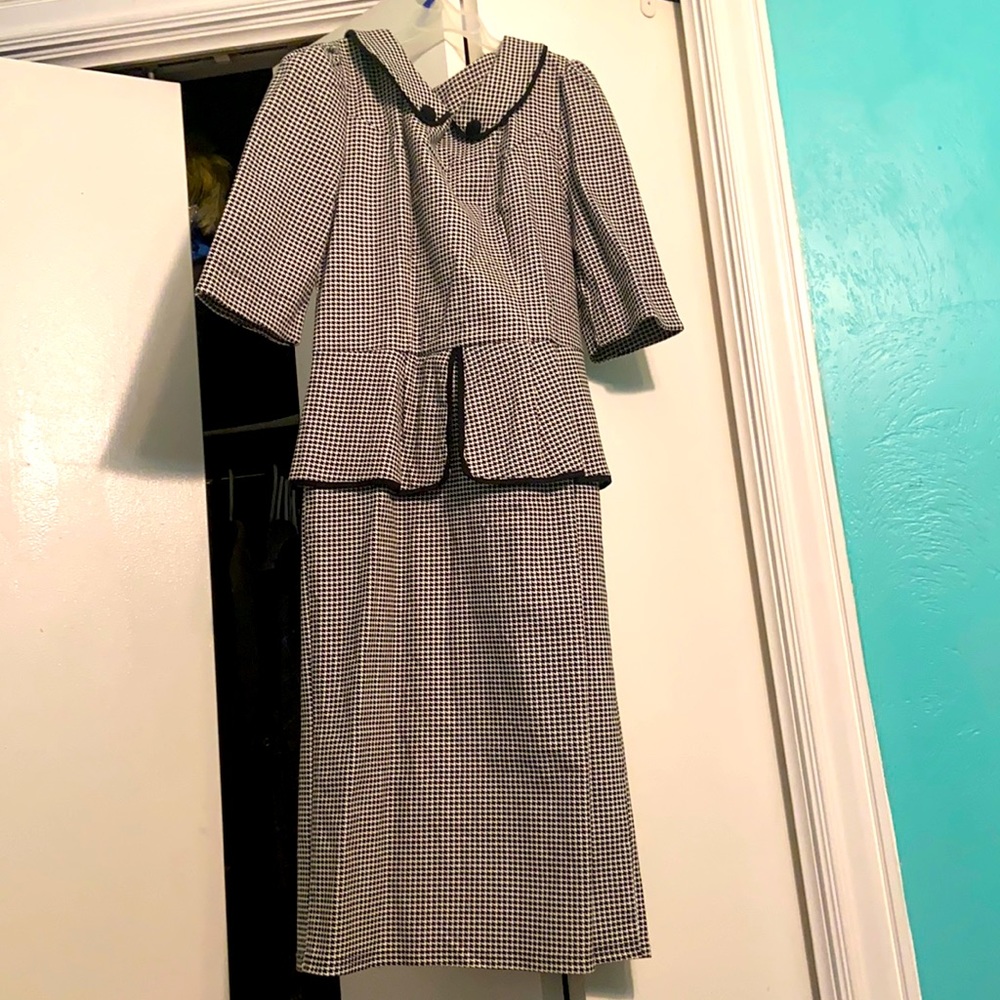 Old fashioned short sleeve peplum styled Dress